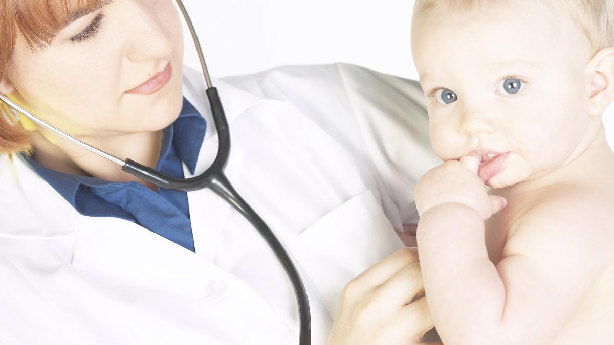 image of doctor holding baby